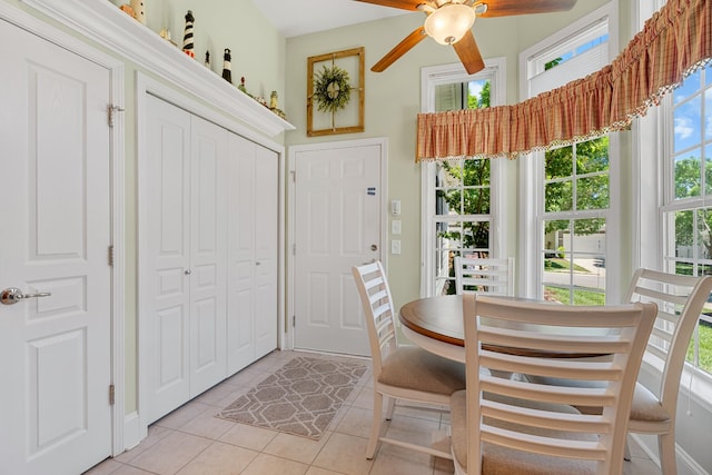 565 Scout Dr, Mount Juliet, TN 37122 - dining space with light tile patterned floors, a ceiling fan, and baseboards