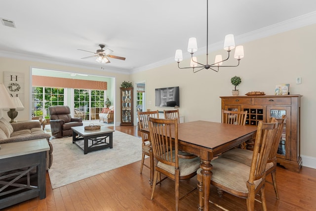 565 Scout Dr, Mount Juliet, TN 37122 - dining area with ornamental molding, hardwood / wood-style floors, ceiling fan, a chandelier, and baseboards