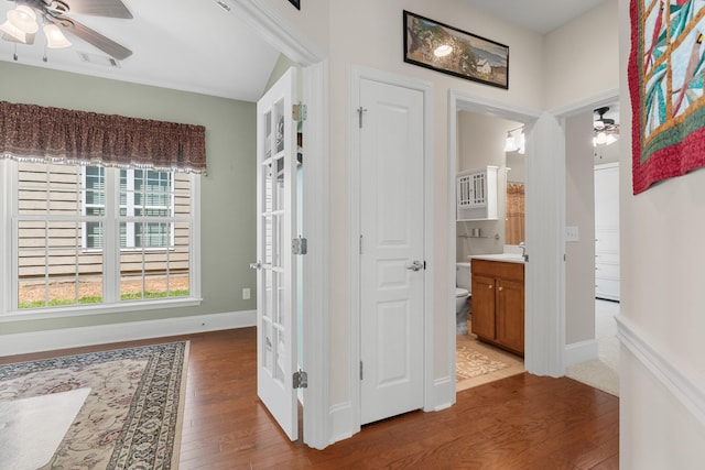 565 Scout Dr, Mount Juliet, TN 37122 - hallway with wood finished floors, baseboards, and a sink