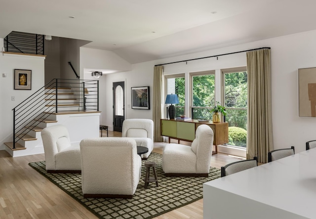 2300 Chickering Ln, Nashville, TN 37215 - living room with light wood-style flooring, stairway, lofted ceiling, and healthy amount of natural light