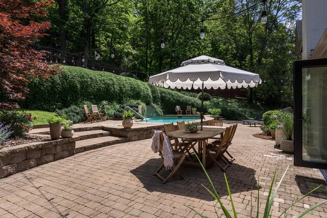 2300 Chickering Ln, Nashville, TN 37215 - view of patio with outdoor dining space, a gazebo, and an outdoor pool