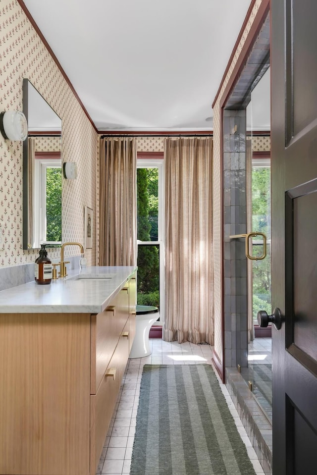2300 Chickering Ln, Nashville, TN 37215 - kitchen featuring wallpapered walls, a sink, tile patterned flooring, and ornamental molding