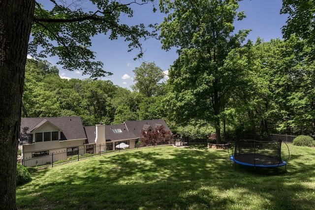 2300 Chickering Ln, Nashville, TN 37215 - view of yard with a trampoline and a view of trees