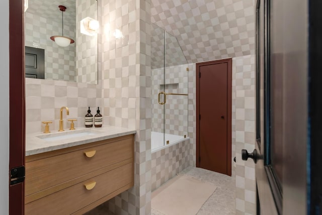 2300 Chickering Ln, Nashville, TN 37215 - full bathroom with tile walls, vanity, tiled shower / bath combo, and tasteful backsplash