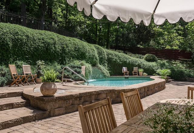 2300 Chickering Ln, Nashville, TN 37215 - view of swimming pool featuring a patio and a fenced backyard