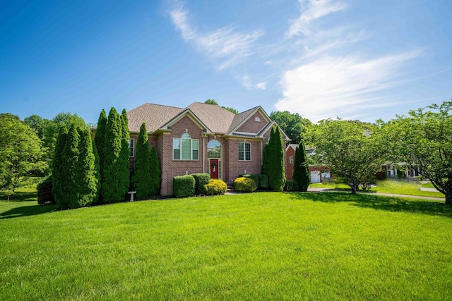 1158 Keystone Dr, Pleasant View, TN 37146 - view of front of property with a front yard and brick siding