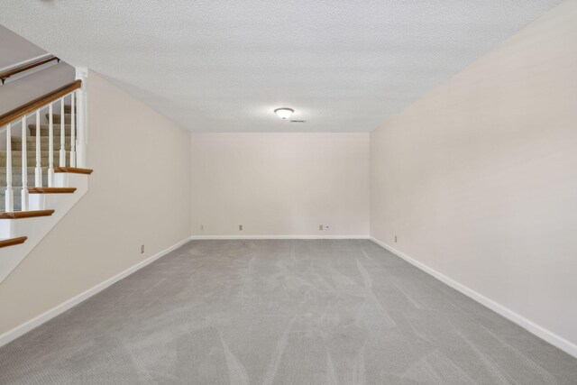 804 Beazer Ln, Antioch, TN 37013 - basement with stairway, carpet floors, baseboards, and a textured ceiling