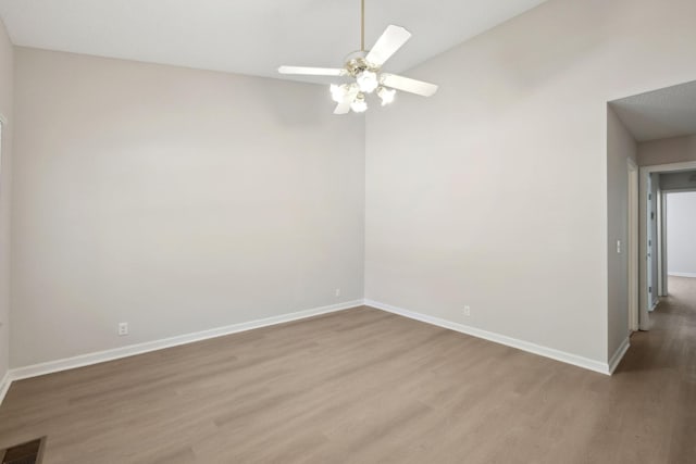804 Beazer Ln, Antioch, TN 37013 - spare room with wood finished floors, baseboards, and a ceiling fan