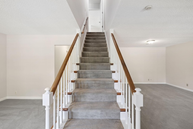 804 Beazer Ln, Antioch, TN 37013 - stairs with carpet, a textured ceiling, and baseboards