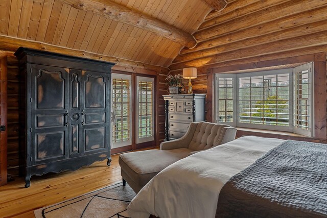 562 Rocky Ridge Rd E, Rock Island, TN 38581 - bedroom featuring rustic walls, wood ceiling, and hardwood / wood-style floors