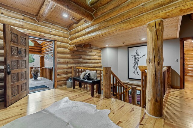 562 Rocky Ridge Rd E, Rock Island, TN 38581 - sitting room featuring an upstairs landing, hardwood / wood-style floors, log walls, recessed lighting, and wooden ceiling with exposed beams