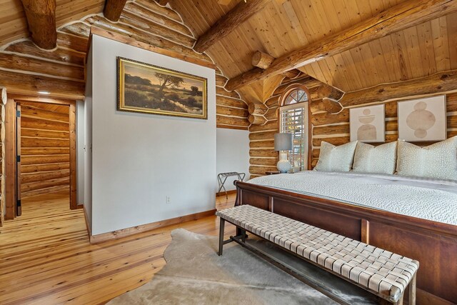 562 Rocky Ridge Rd E, Rock Island, TN 38581 - bedroom with rustic walls, wooden ceiling, and hardwood / wood-style floors
