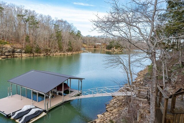 562 Rocky Ridge Rd E, Rock Island, TN 38581 - dock with a water view, boat lift, and a forest view