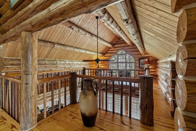 562 Rocky Ridge Rd E, Rock Island, TN 38581 - interior space with log walls, hardwood / wood-style floors, wood ceiling with exposed beams, a ceiling fan, and high vaulted ceiling
