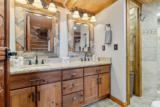 562 Rocky Ridge Rd E, Rock Island, TN 38581 - bathroom with wooden ceiling, double vanity, baseboards, and a shower