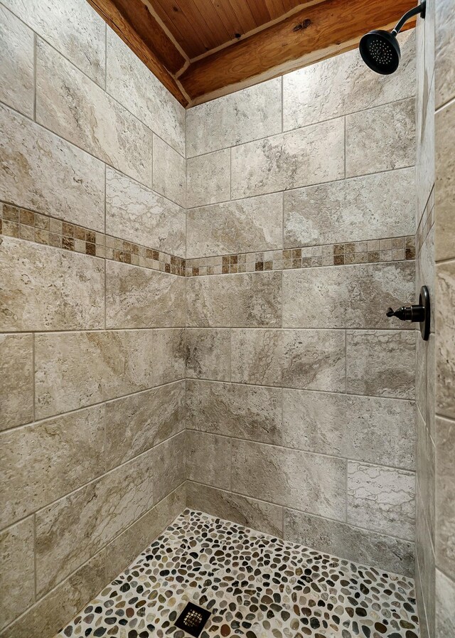 562 Rocky Ridge Rd E, Rock Island, TN 38581 - full bath with tiled shower and wood ceiling