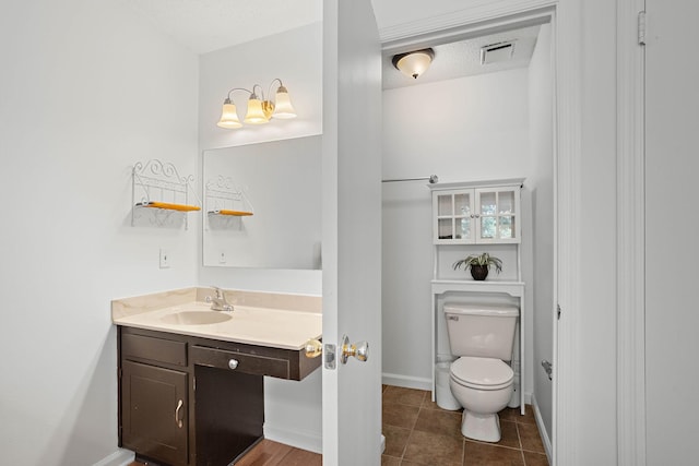 684 Dutchmans Dr, Hermitage, TN 37076 - bathroom featuring vanity, toilet, baseboards, and tile patterned flooring