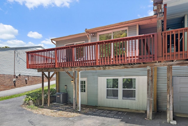 684 Dutchmans Dr, Hermitage, TN 37076 - back of property featuring central air condition unit and a deck