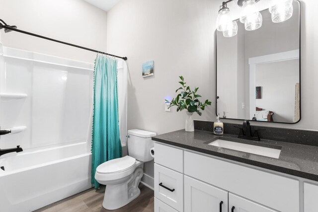 207 Charleston Ave, Pleasant View, TN 37146 - full bath with wood finished floors, vanity, shower / bath combo, and toilet