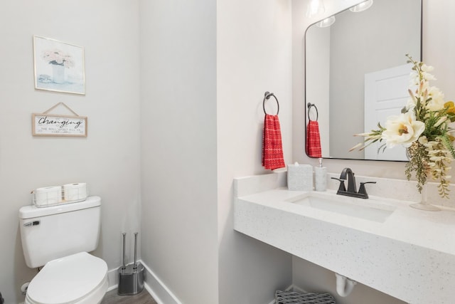 207 Charleston Ave, Pleasant View, TN 37146 - half bath with a sink, toilet, and baseboards