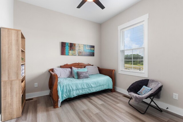 207 Charleston Ave, Pleasant View, TN 37146 - bedroom with light wood-type flooring, baseboards, and ceiling fan