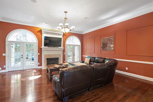 30 Park Mdws, Nashville, TN 37215 - living area with french doors, a chandelier, crown molding, dark wood-type flooring, and a fireplace