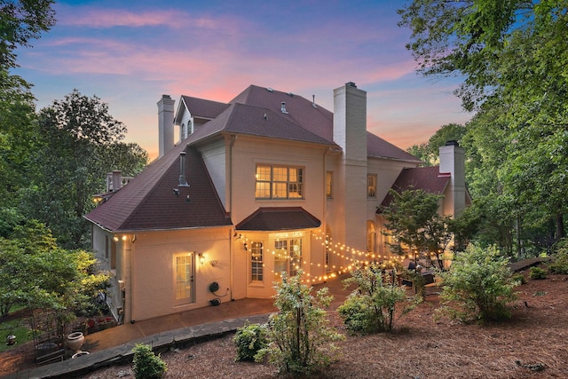 30 Park Mdws, Nashville, TN 37215 - back of house with a chimney, a patio area, and roof with shingles