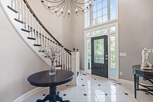 30 Park Mdws, Nashville, TN 37215 - entrance foyer with a high ceiling, plenty of natural light, stairs, light tile patterned floors, and a chandelier