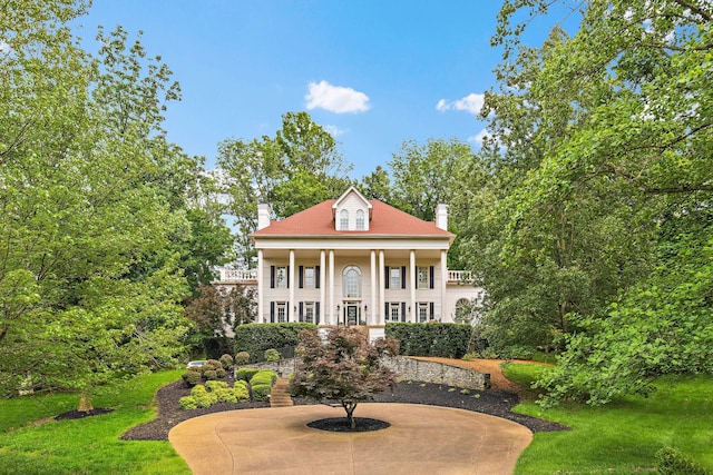 30 Park Mdws, Nashville, TN 37215 - view of front facade featuring a chimney, a front yard, and a porch
