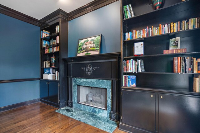 30 Park Mdws, Nashville, TN 37215 - living room featuring ornamental molding, a premium fireplace, wood finished floors, and built in features