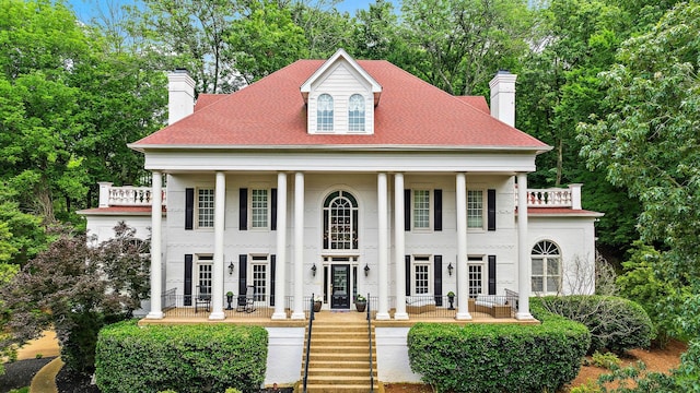 30 Park Mdws, Nashville, TN 37215 - greek revival house featuring a chimney, a balcony, french doors, and a porch