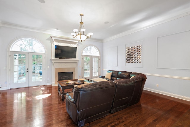 30 Park Mdws, Nashville, TN 37215 - living room featuring french doors, ornamental molding, plenty of natural light, a chandelier, and dark wood-style floors