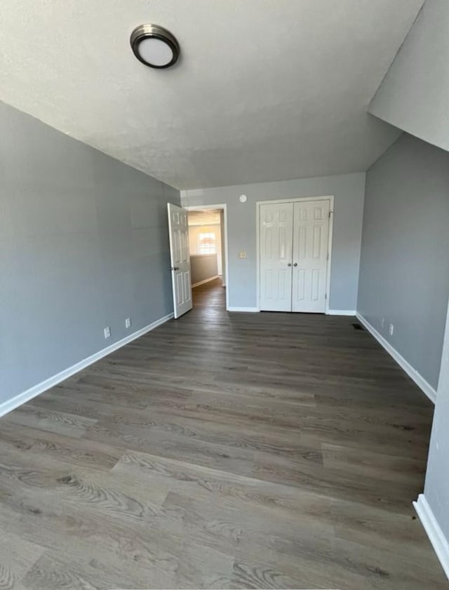 3715 Red Willow Ct, Murfreesboro, TN 37128 - unfurnished bedroom featuring baseboards, wood finished floors, and a closet