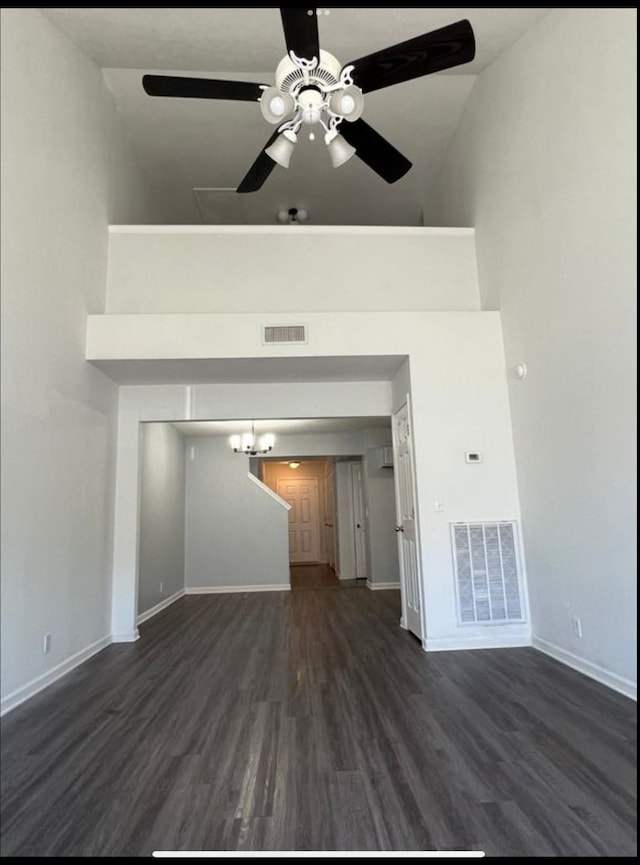 3715 Red Willow Ct, Murfreesboro, TN 37128 - unfurnished living room featuring high vaulted ceiling, dark wood finished floors, ceiling fan, baseboards, and a chandelier