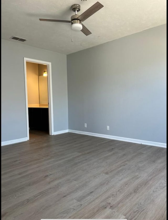 3715 Red Willow Ct, Murfreesboro, TN 37128 - empty room featuring a ceiling fan, dark wood finished floors, and baseboards