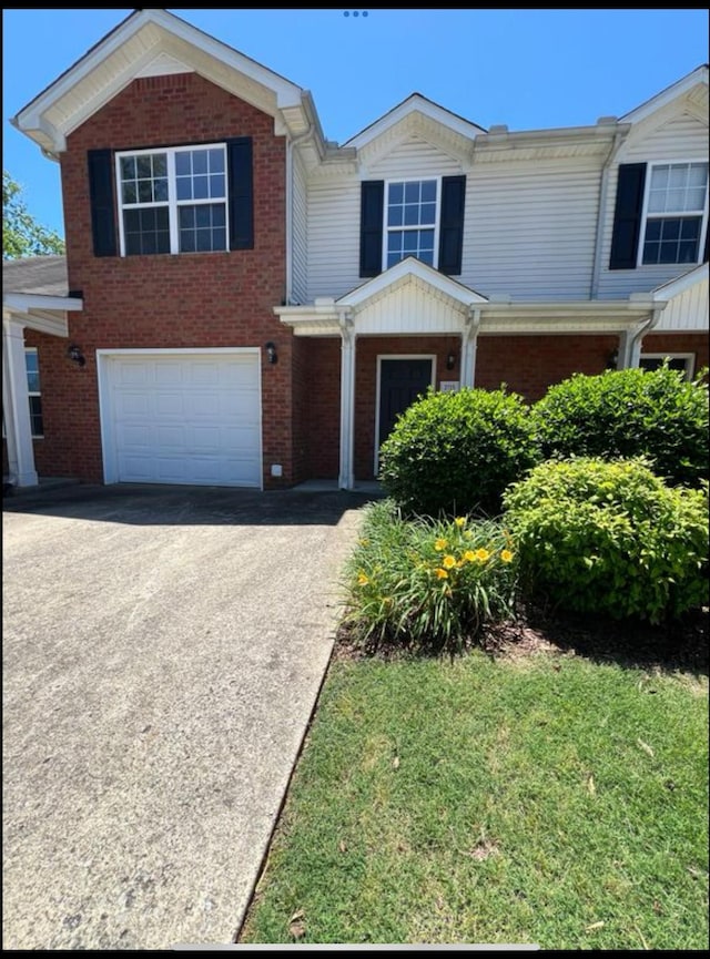 3715 Red Willow Ct, Murfreesboro, TN 37128 - view of front of home with an attached garage, brick siding, and asphalt driveway