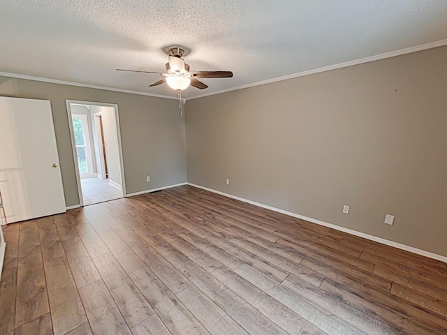 7 E Ln, Fayetteville, TN 37334 - empty room featuring a ceiling fan, wood finished floors, ornamental molding, baseboards, and a textured ceiling