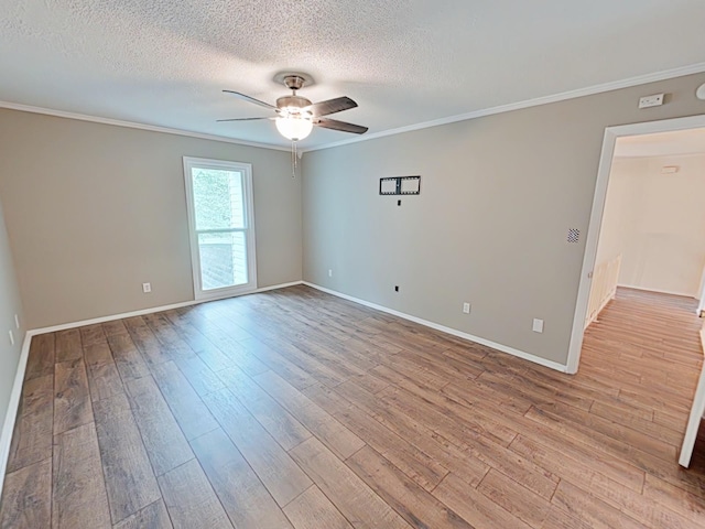 7 E Ln, Fayetteville, TN 37334 - spare room featuring ornamental molding, ceiling fan, light wood-style floors, baseboards, and a textured ceiling