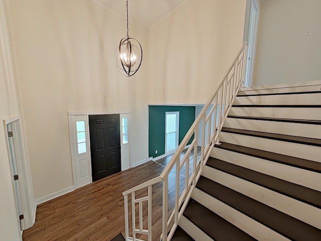 7 E Ln, Fayetteville, TN 37334 - entryway with high vaulted ceiling, stairway, wood finished floors, a chandelier, and plenty of natural light