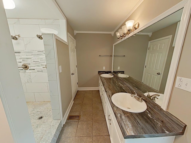 7 E Ln, Fayetteville, TN 37334 - bathroom featuring double vanity, tile patterned floors, a tile shower, ornamental molding, and baseboards
