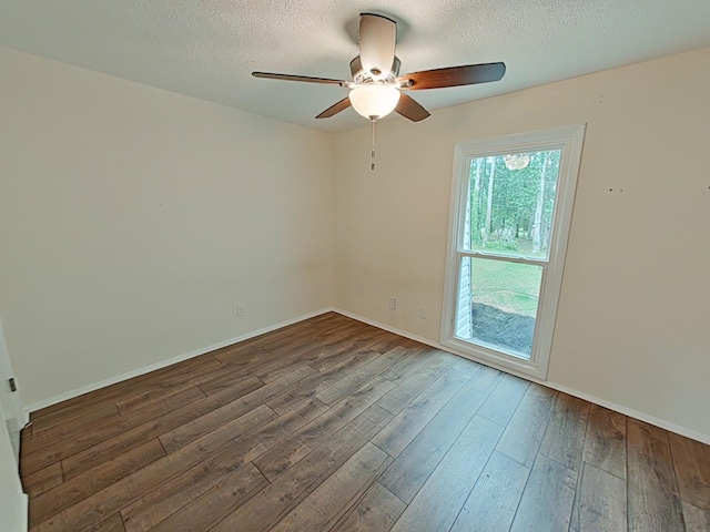 7 E Ln, Fayetteville, TN 37334 - spare room featuring ceiling fan, wood finished floors, a textured ceiling, and baseboards