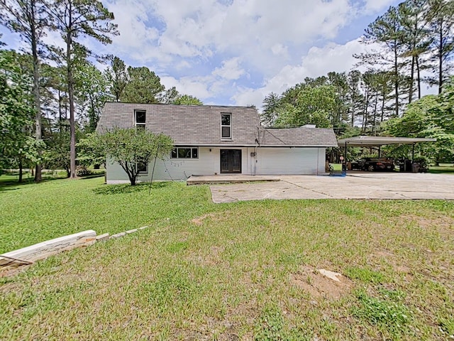 7 E Ln, Fayetteville, TN 37334 - view of front of house featuring concrete driveway, a carport, and a front yard