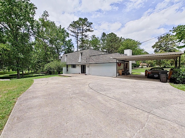 7 E Ln, Fayetteville, TN 37334 - view of front facade featuring driveway, a carport, a front lawn, and a chimney