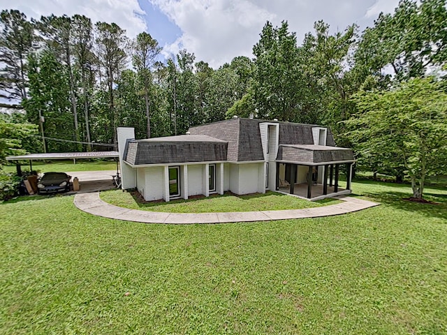 7 E Ln, Fayetteville, TN 37334 - view of front of house featuring a shingled roof, a front yard, and mansard roof