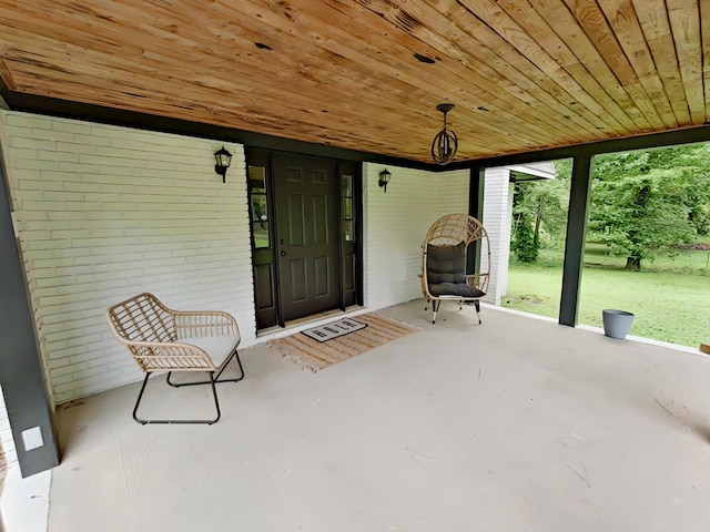 7 E Ln, Fayetteville, TN 37334 - view of exterior entry featuring brick siding and a lawn