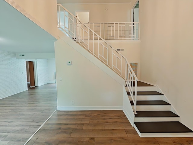 7 E Ln, Fayetteville, TN 37334 - stairway featuring wood finished floors, baseboards, and a high ceiling