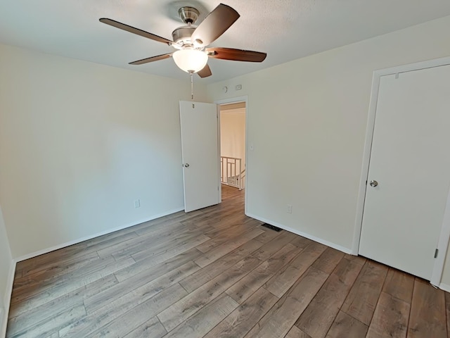 7 E Ln, Fayetteville, TN 37334 - unfurnished bedroom with wood finished floors and a ceiling fan
