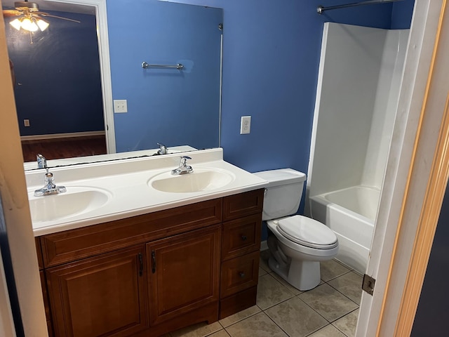 168 Commodore Cir, Summertown, TN 38483 - bathroom with double vanity, toilet, tile patterned flooring, a ceiling fan, and bathtub / shower combination