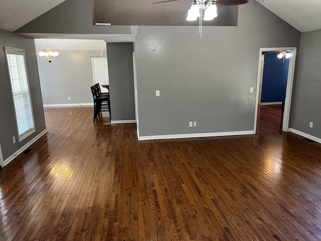 168 Commodore Cir, Summertown, TN 38483 - spare room featuring a ceiling fan, lofted ceiling, a chandelier, and dark wood finished floors