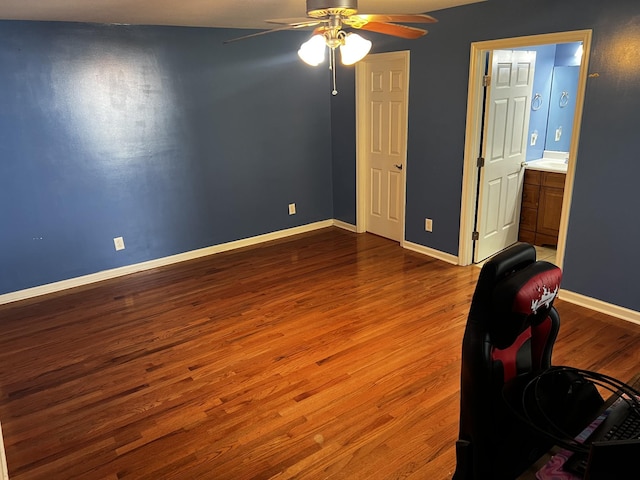 168 Commodore Cir, Summertown, TN 38483 - bedroom featuring wood finished floors, an office area, baseboards, and a ceiling fan